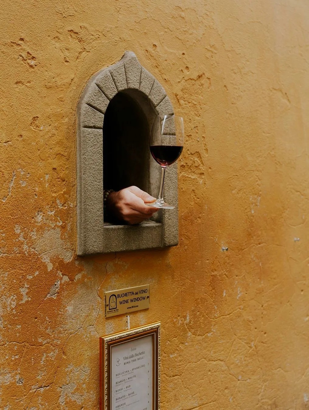 Wine served through a historic wine door